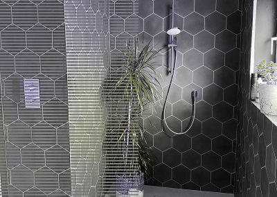 Modern Black Hexagon Tile Shower with Matte Fixtures | Tiles Gone Wild Newburyport MA