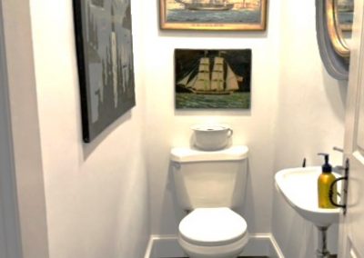 Timeless Navy-Black Herringbone Tile Floor with Ship-Themed Decor | Newburyport MA